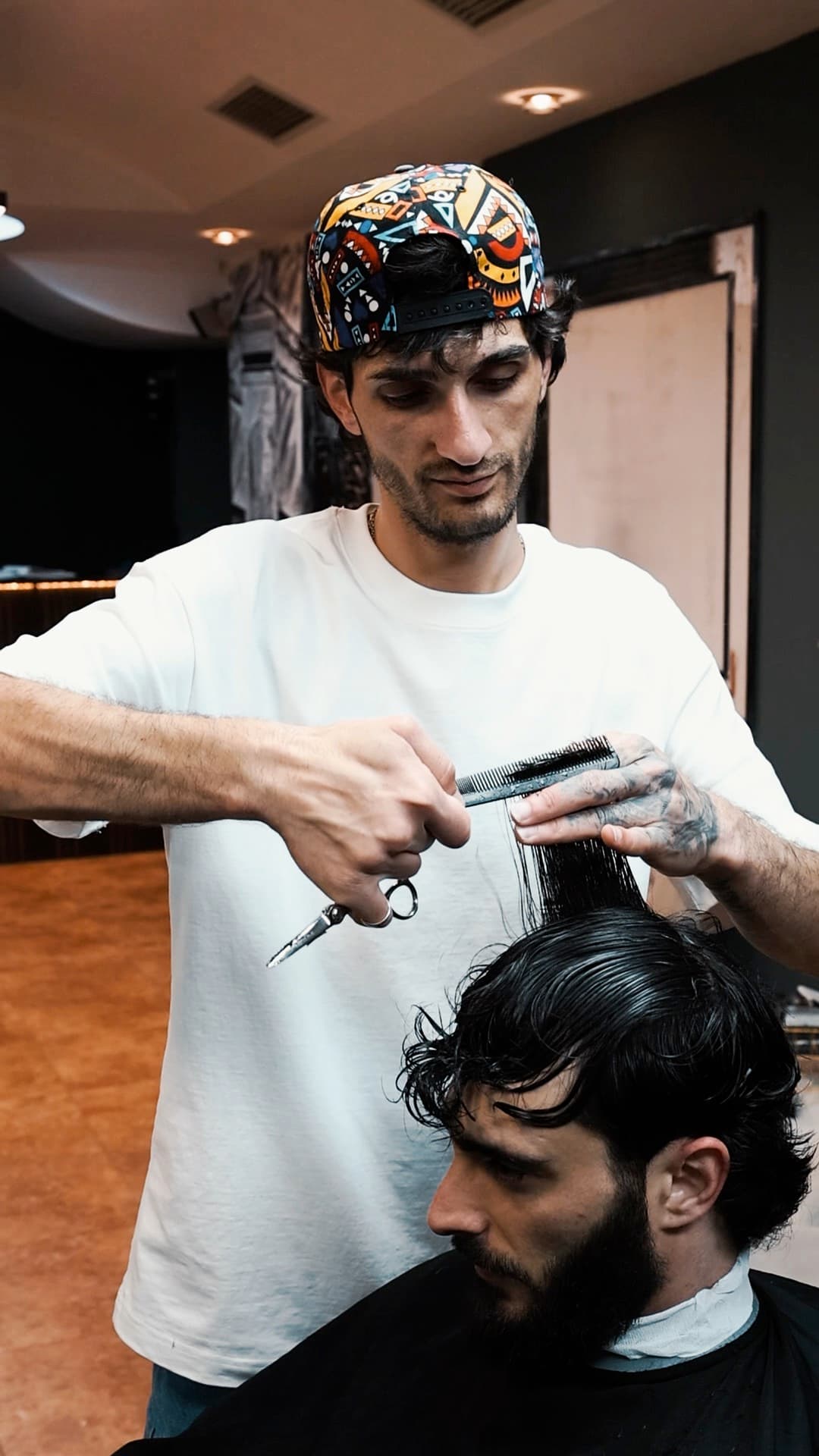 Haircut and beard trim in progress at Dekad Barbershop, Yerevan