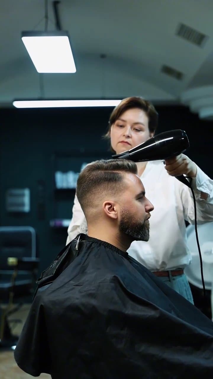 Haircut and beard trim in progress at Dekad Barbershop, Yerevan